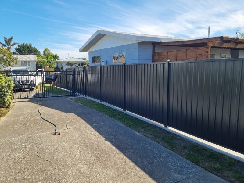 Black ColorSteel fence and gate