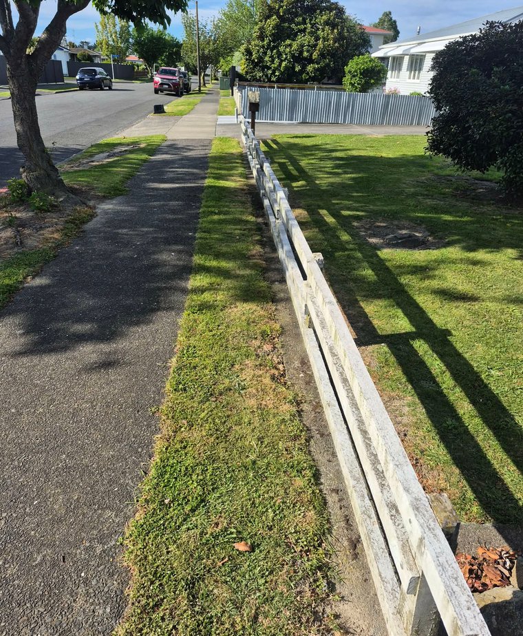 Napier ColorSteel fence before photo